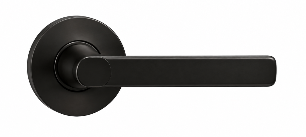 Modern matte black door handle on white background